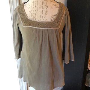 Boho top with satin trim.